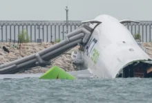 Cargo plane skids off runway into sea Hong Kong